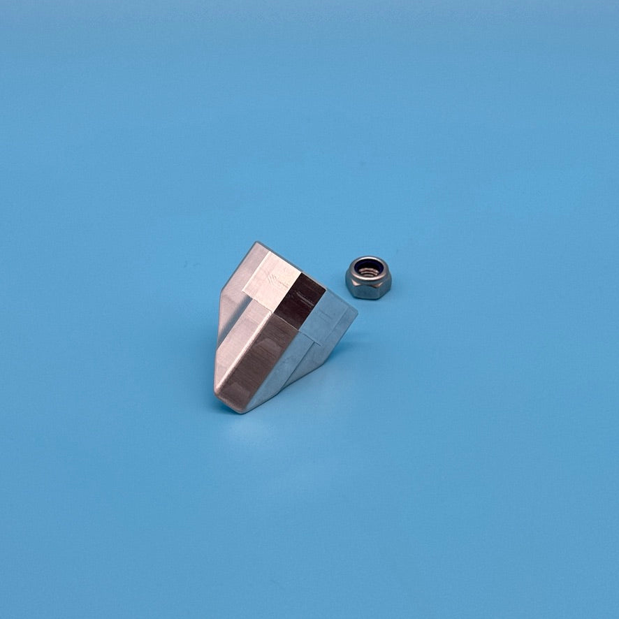 Front view of bare aluminum locking wedge for Thule Helium Platform XT bike rack, paired with lock nut.