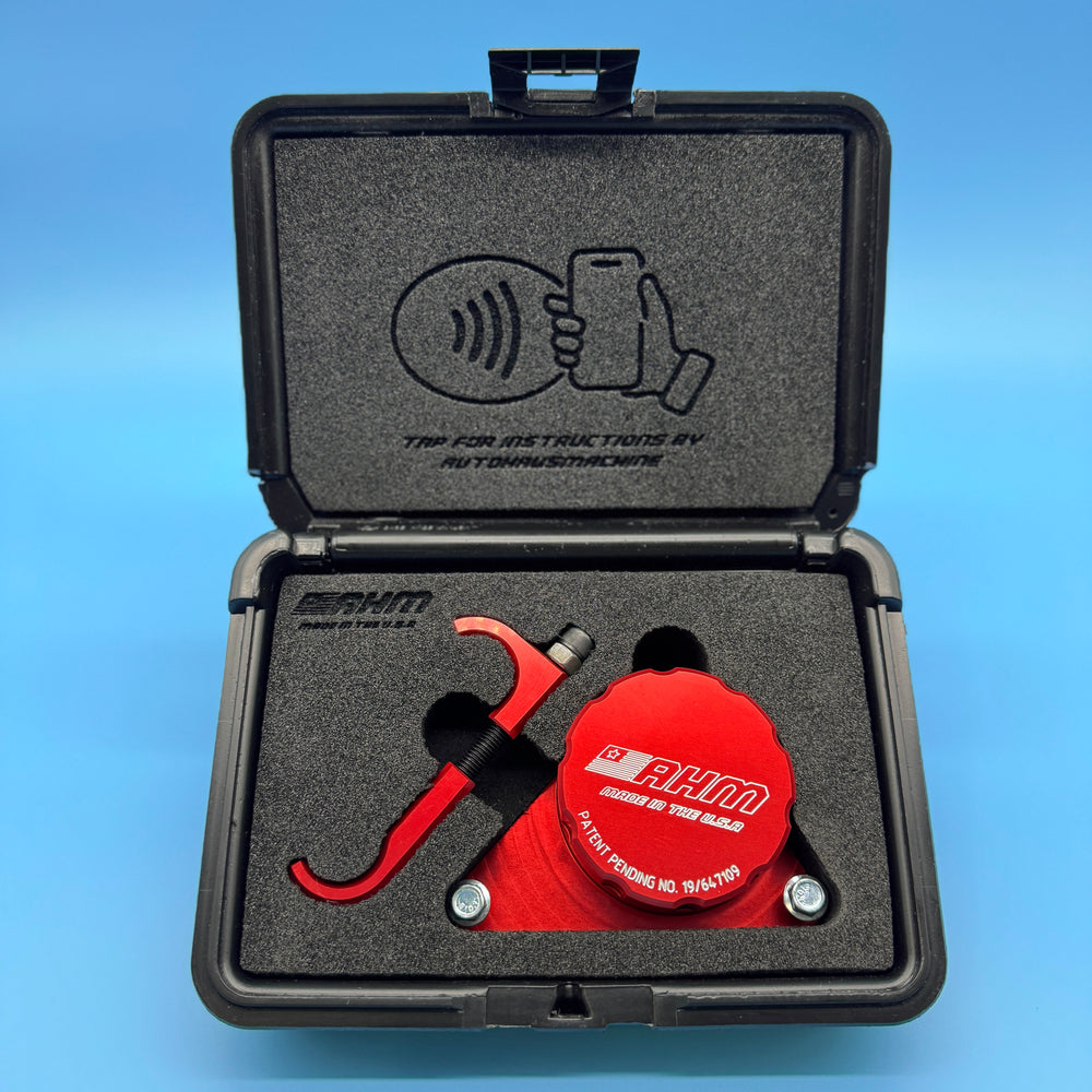 VW & Audi 2.0T cam bridge tool kit packaged in a foam-lined black case with hook arm and red locking disc.