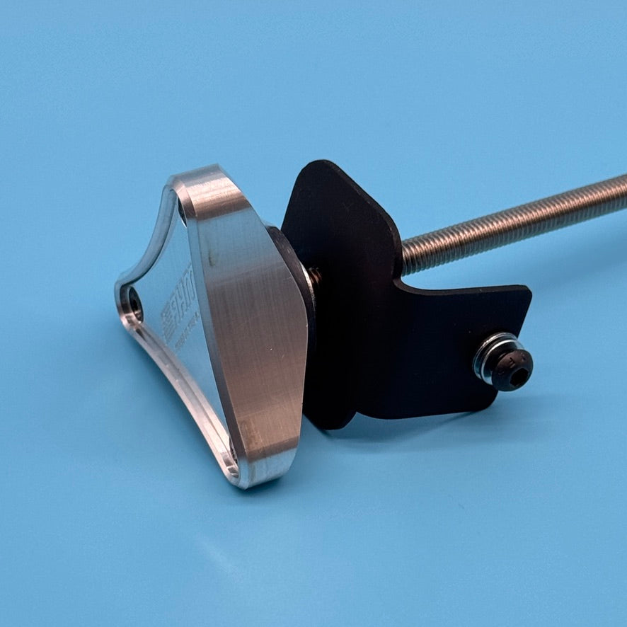 Close-up of raw aluminum Thule T2 wedge handle with black L-bracket and threaded rod set screw.