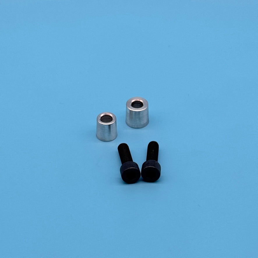 Bare aluminum CNC battery terminal adapter bushings with two black socket-head bolts for Jaguar/LR4.