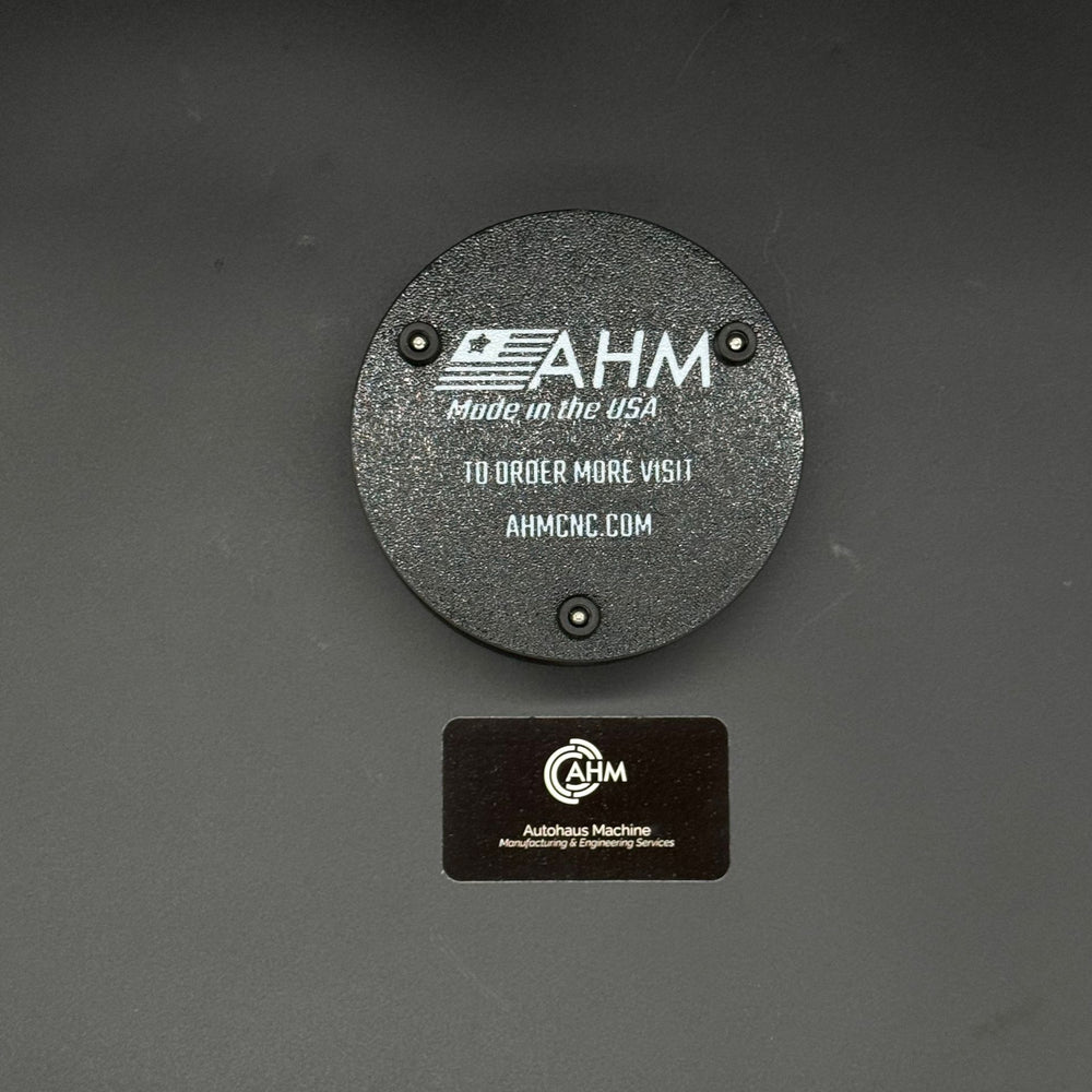Black organizer lid engraved AHM Made in the USA and AHMCNC.COM with three screws.