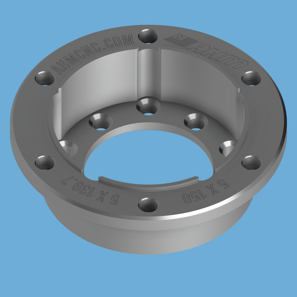 Top view of CNC ProHub PH14 dyno adapter engraved AHMCNC.COM with 5x139.7 and 5x150 lug patterns.