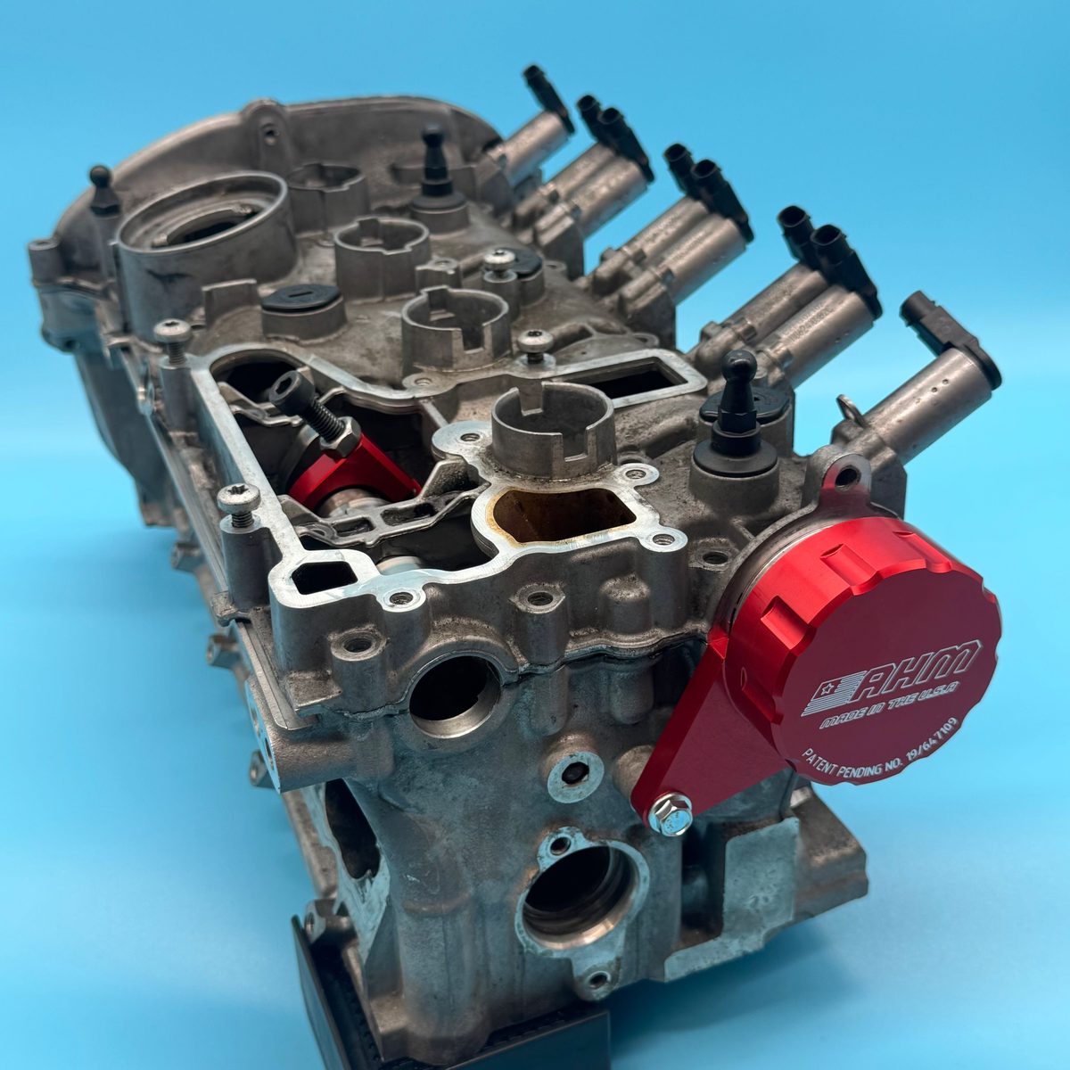 EA888 cylinder head with both intake and exhaust camshaft retaining tools installed