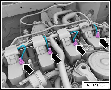 Removing the ground cable and disconnecting the ignition coil connectors